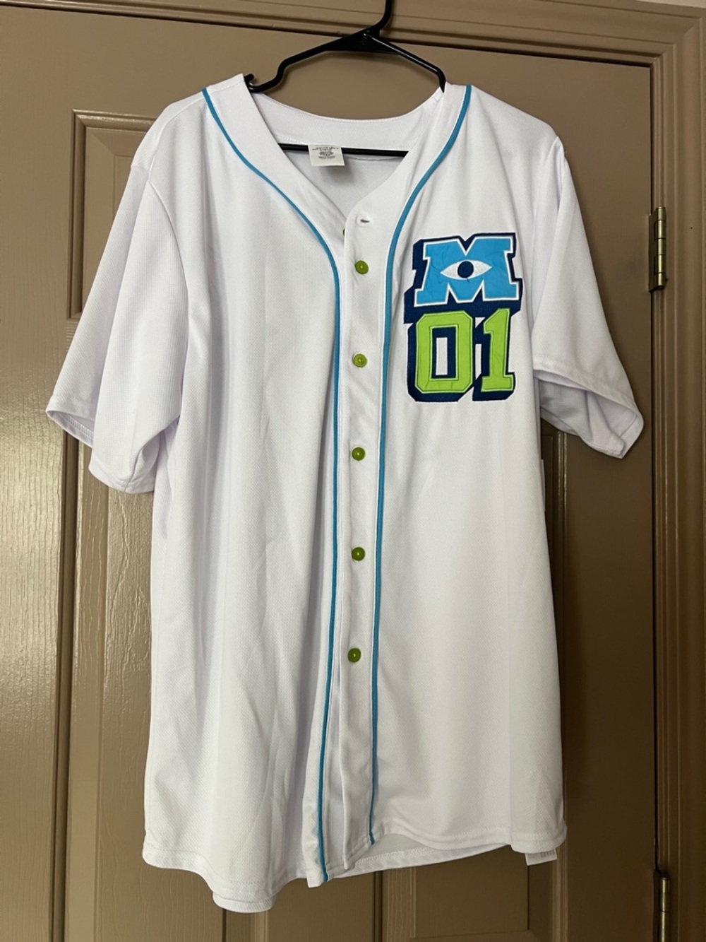 Monsters Inc Wazowski Disney Parks  White Jersey with Blue Trim and Lime Green